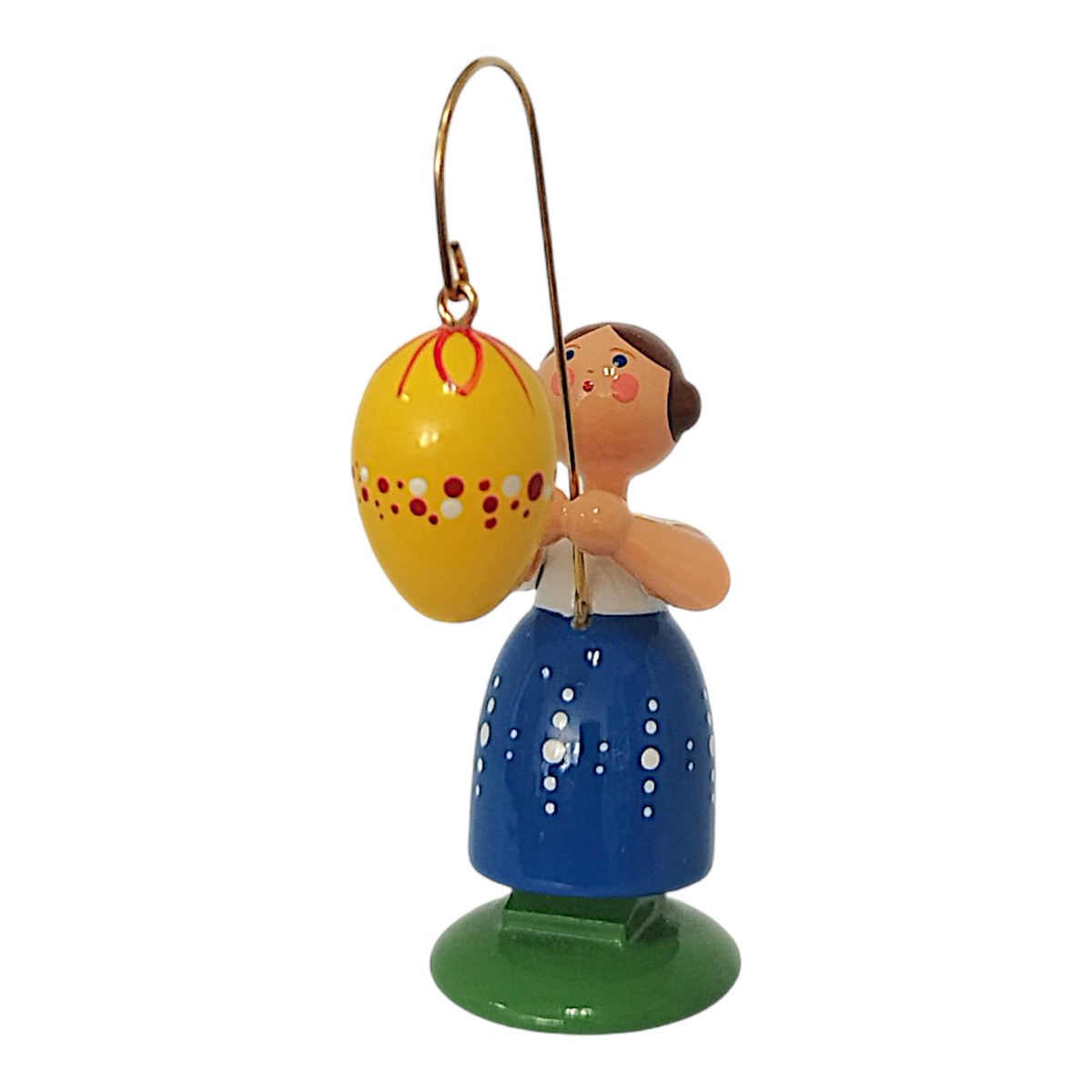 Easter girl with yellow egg and blue skirt