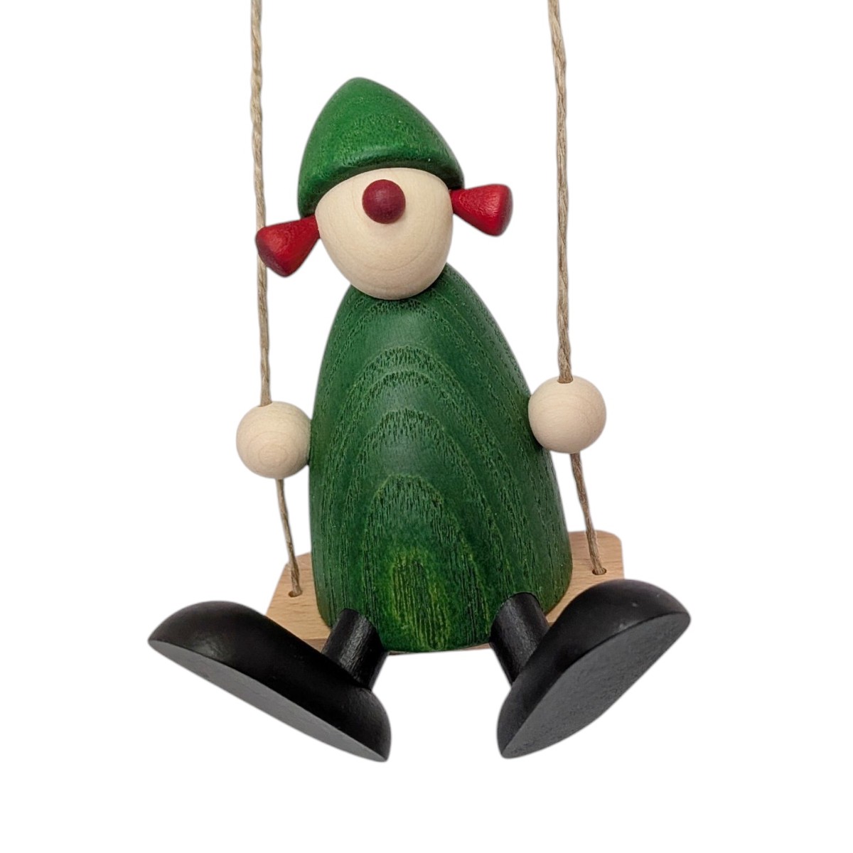 Well-wisher Frieda on a swing, green